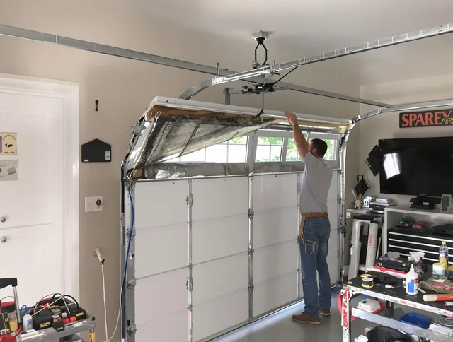 Garage door section replacement by Kendall Garage Door Repair in Kendall