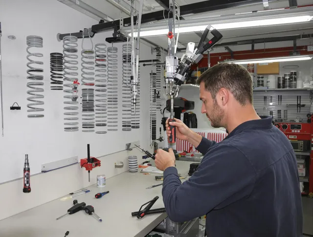 Kendall Garage Door Repair safety certified technician performing precision spring replacement in Kendall