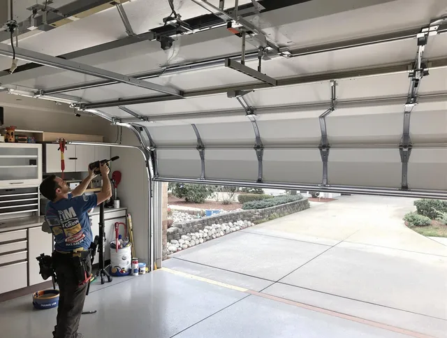 Garage door track repair service by Kendall Garage Door Repair in Kendall